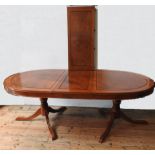 A 20TH CENTURY ANGLO-CHINESE ROSEWOOD EXTENDING DINING TABLE, produced in Hong Kong in the mid