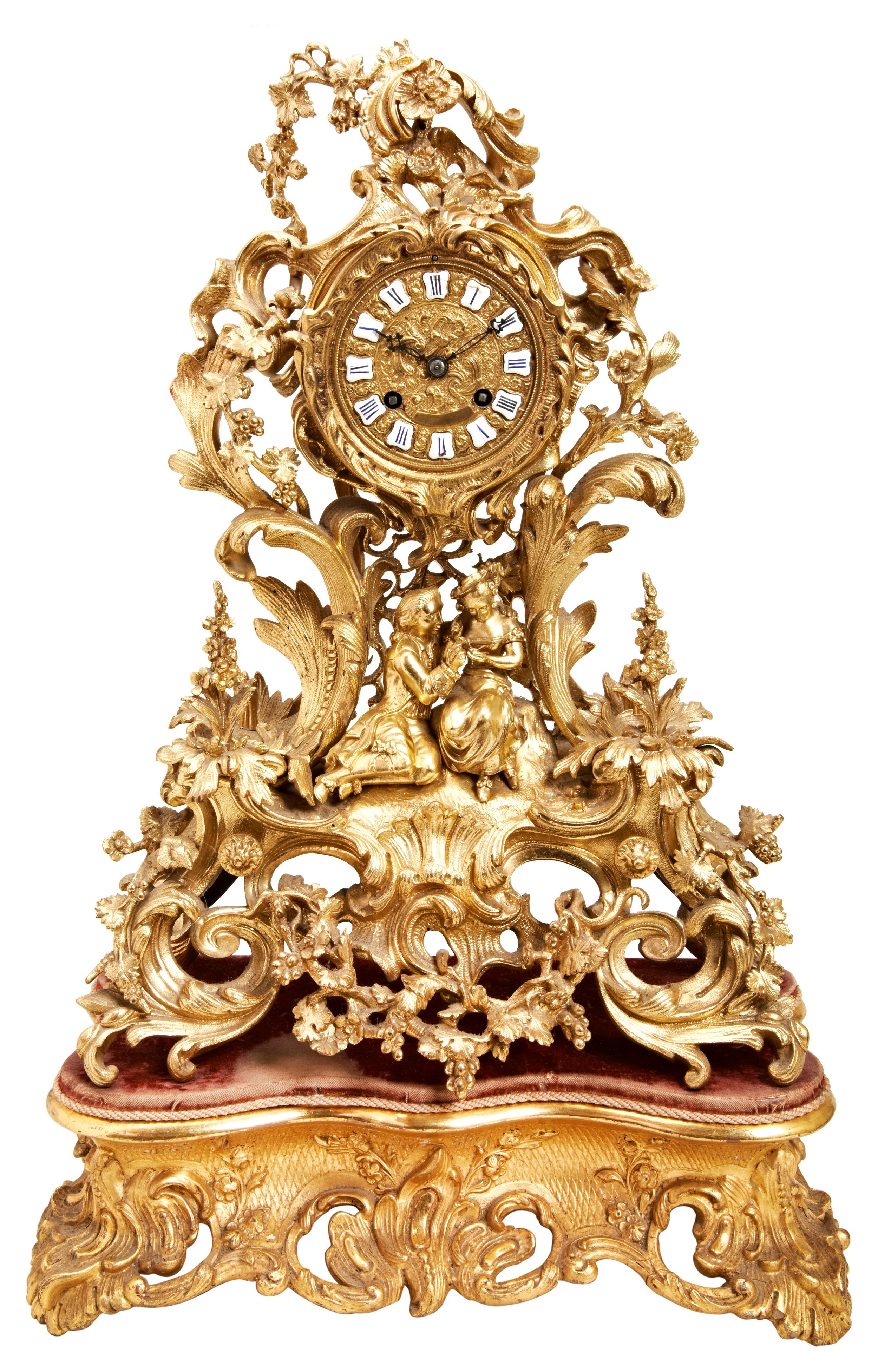 A FRENCH EARLY 19TH CENTURY ORNATE BRASS MANTEL CLOCK, the back plate of the movement stamped