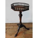 A 19TH CENTURY WALNUT TRIPOD TABLE WITH GALLERY EDGED OCTAGONAL TOP, with a tapered turned