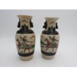 SMALL PAIR CANTON VASES LATE QING DYNASTY painted with warriors on horseback 20cm high