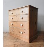 A VICTORIAN WAXED PINE CHEST OF FIVE DRAWERS, two short drawers over three long drawers, with