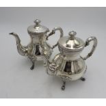 A PERUVIAN SILVER TEA AND COFFEE SERVICE BY CAMUSSO, comprising of a tea pot, coffee pot, hot