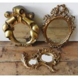 A 19TH CENTURY SCROLL DECORATED GILT MIRROR, SWAG DECORATED BRASS MIRROR AND TWO OVAL MIRROR