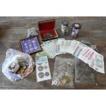 A LARGE QUANTITY OF BRITISH COINAGE, U.S COINAGE, FOREIGN CURRENCY BANK NOTES AND ELEVEN