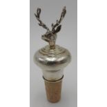 A MAPPIN & WEBB HALLMARK SILVER BOTTLE STOPPER WITH STAG'S HEAD DECORATION, 10 cm high