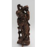 CARVED HARDWOOD OKIMONO OF AN ONI MEIJI PERIOD (1868-1912) 23cm high