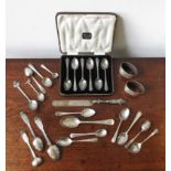 A SET OF SIX HALLMARK SILVER TEASPOONS, TWO SILVER NAPKING RINGS, BUTTER KNIFE AND SIXTEEN VARIOUS