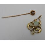 A 9CT GOLD PENDANT SET WITH TWO OPALS AND A GOLD OPAL SET STICK PIN