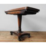 A VICTORIAN MAHOGANY FOLDING CARD TABLE, ,the folding baize lined top sitting atop a tapered