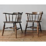 TWO 19TH CENTURY SMOKER'S BOW CHAIRS, with twin stretcher bar supports, turned legs and turned