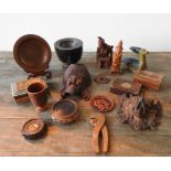 CARVED TREEN ORNAMENTS INCLUDING CHINESE WALL MASKS, STANDS, TRINKET BOXES AND FIGURES (17)