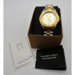 A GENT'S CREDIT SUISSE GOLD PLATED STAINLESS STEEL WRISTWATCH SET WITH GOLD INGOT, water reistant