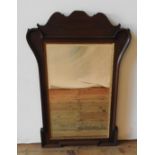 A 19TH CENTURY MAHOGANY FRAMED WALL MIRROR, with gilt foliate beading and shaped fret and cut