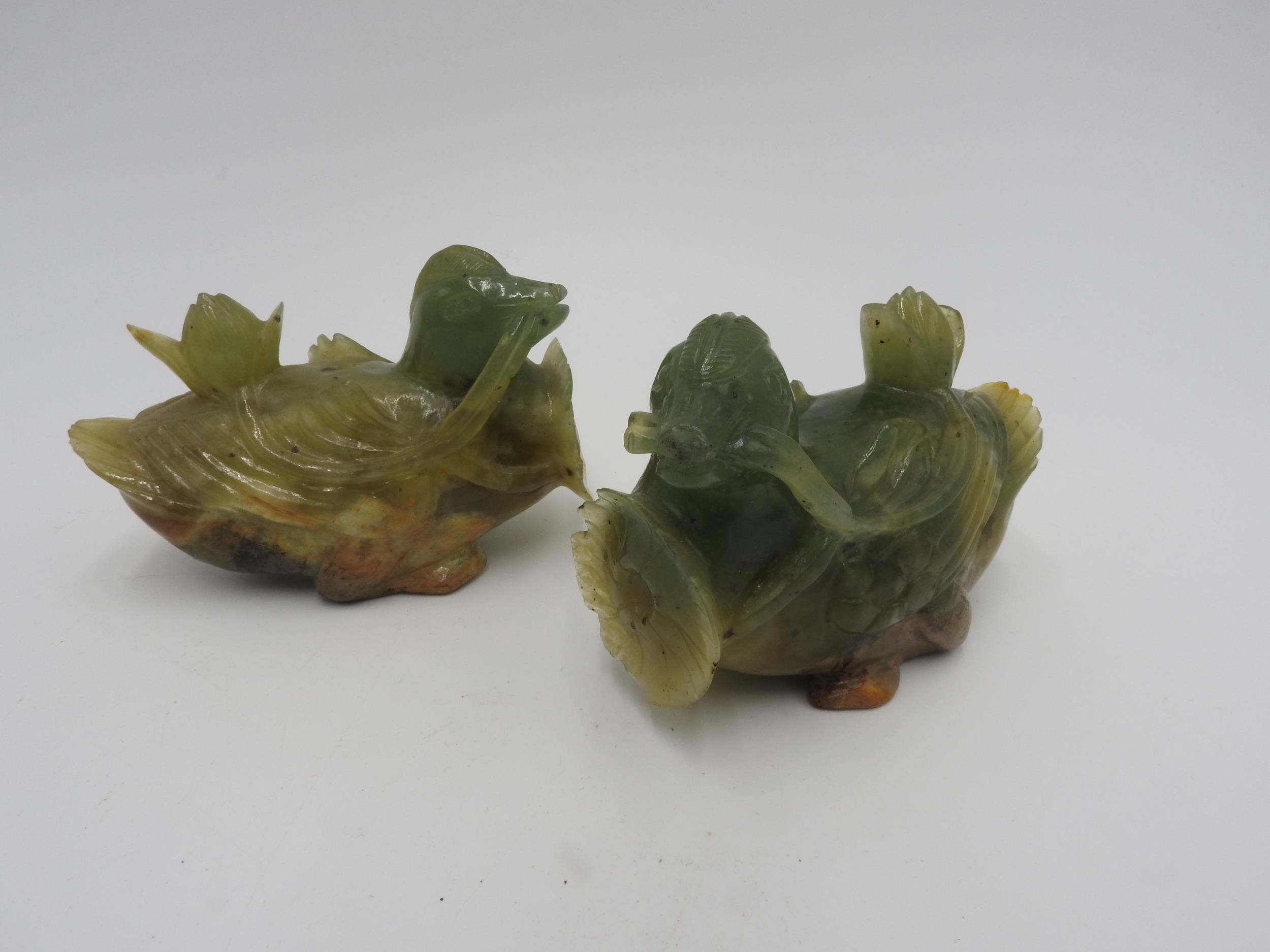 PAIR OF CHINESE CARVED GREEN-HARDSTONE DUCKS 20TH CENTURY 6cm high