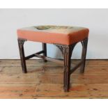 A 19TH CENTURY MAHOGANY FRAMED TAPESTRY TOP STOOL, the tapestry depiciting a floral arrangement, the