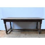 A FRENCH 19TH CENTURY OAK FARMHOUSE TABLE ON TURNED LEGS, with stretcher bar support, 74 x 179 x