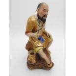 CHINESE GLAZED PORCELAIN FIGURE 20TH CENTURY 29cm high