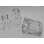 TWO HOLMEGAARD DANISH LEAD CRYSTAL INUIT PAPERWEIGHTS AND A REIJMYRE SWEDISH ART GLASS