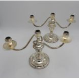A PAIR OF PERUVIAN SILVER THREE BRANCH CANDELABRA BY CAMUSSO, two elegant serpentine branches