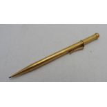 AN 18CT GOLD PROPELLING PENCIL WITH 9CT GOLD CLIP