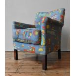 A CHILD'S NURSERY ARMCHAIR UPHOLSTERED WITH TEDDY BEAR PATTERNED FABRIC, 77 x 63 x  51 cm