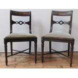 A SET OF FOUR VICTORIAN MAHOGANY DINING CHAIRS, with turned legs supported by cross stretchers,