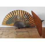 A HAND PAINTED PEACOCK DECORATED FAN AND TWO PARASOLS, the fan 132 cm wide when open