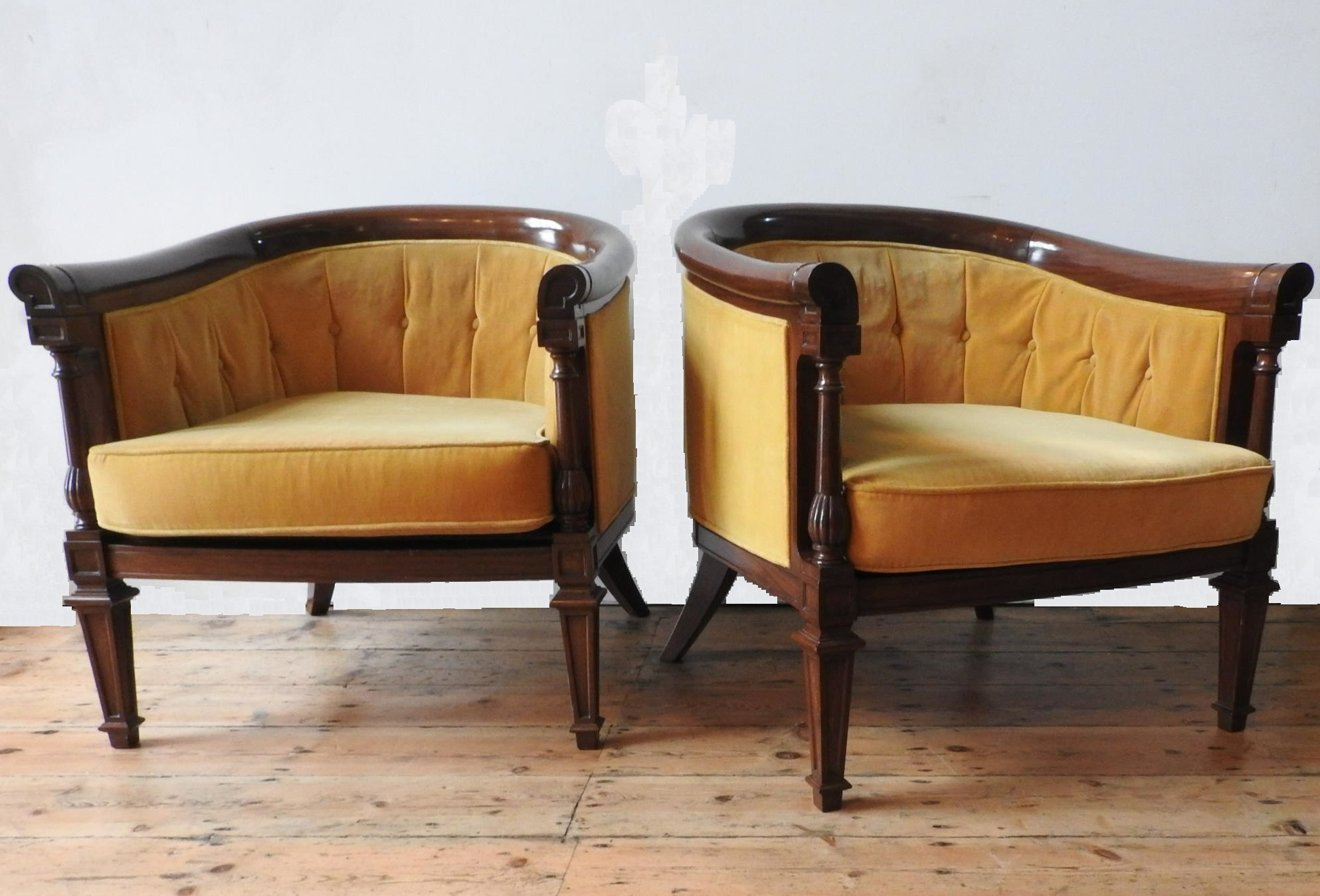 A PAIR OF ANGLO-CHINESE ROSEWOOD BERGERES, with gold coloured button back upholstery and removable
