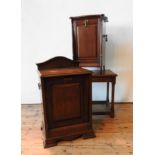 TWO VICTORIAN COAL PURDONIUMS AND AN OAK COFFEE TABLE, one oak and one mahogany purdonium, the
