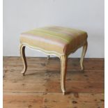 A FRENCH 19TH CENTURY GILDED SALON STOOL, on cabriolet legs, 37cm high, 49cm square