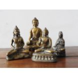 FOUR CAST BRONZE SEATED BUDDHA FIGURES, 20 cm high and three smaller