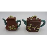 TWO CHINESE FAMILLE-ROSE YIXING POTTERY TEAPOTS 20TH CENTURY 11cm high approx.
