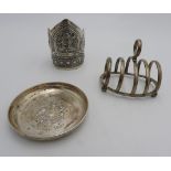 A HALLMARK SILVER TOAST RACK AND PIN TRAY, AND AN ASIAN SILVER BANGLE, the bangle decorated with