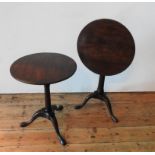 TWO 19TH CENTURY TILT-TOP TRIPOD TABLES, one in mahogany and one with a mahogany top on a stained