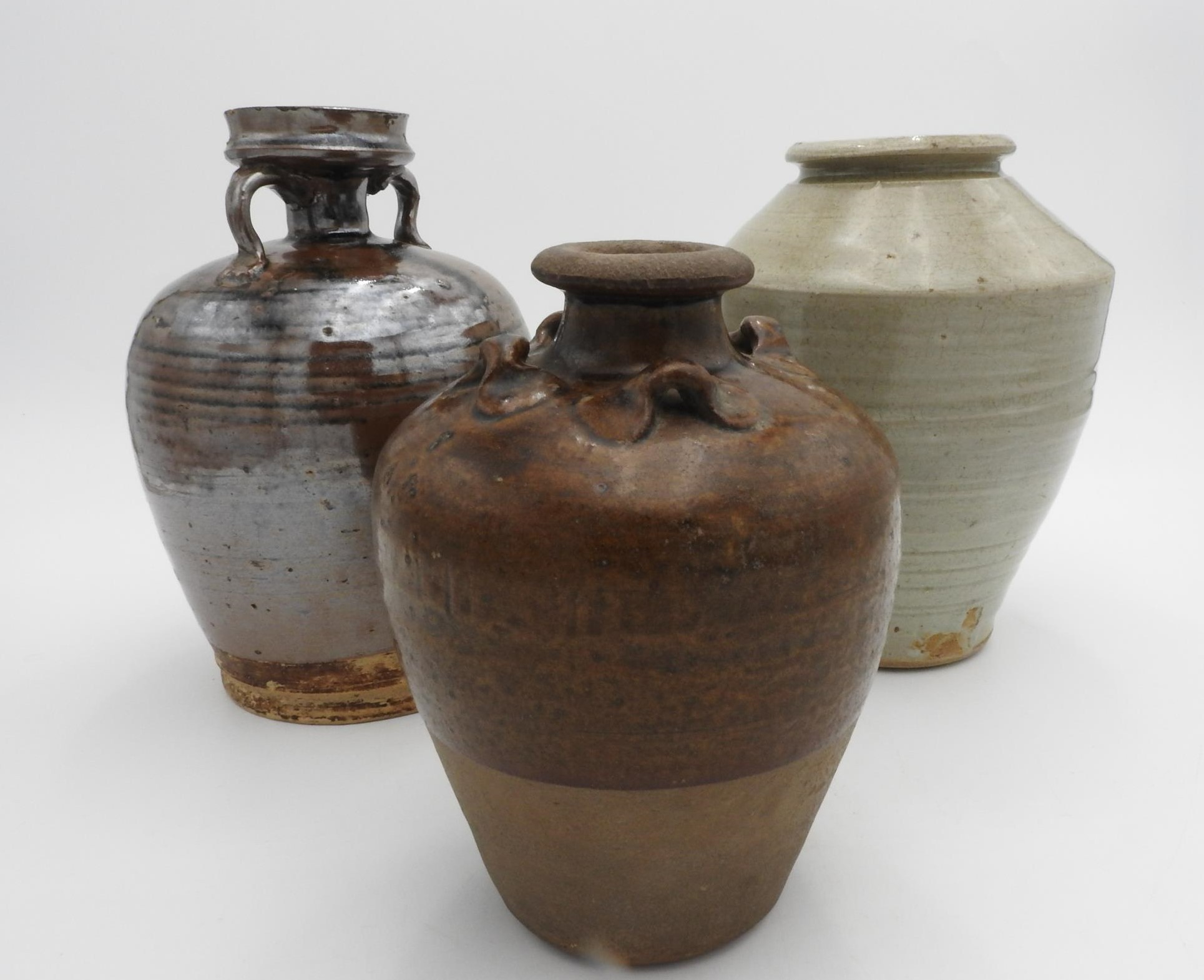 THREE CHINESE GLAZED POTTERY JARS SONG DYNASTY OR LATER 18cm, 20cm & 21cm high