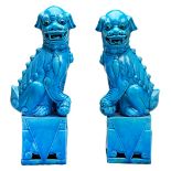 PAIR OF TURQUOISE-GLAZE BUDDHISTIC LIONS LATE QING DYNASTY modelled as the female with a pup playing