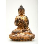 GILT-BRONZE FIGURE OF SHAKYAMUNI BUDDHA QING DYNASTY, 18TH / 19TH CENTURY seated in