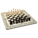 ANGLO-INDIAN IVORY, HORN AND SANDALWOOD CHESS SET, BOX AND BOARD VIZAGAPATAM, MID 19TH CENTURY The