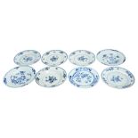 SET OF EIGHT CHINESE EXPORT BLUE AND WHITE PLATES QING DYNASTY, 18TH CENTURY painted in tones of