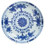 LARGE BLUE AND WHITE CHARGER KANGXI PERIOD (1662-1722) painted in tones of underglaze blue with a