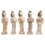 GROUP OF FIVE PAINTED POTTERY LADIES TANG DYNASTY each standing in an elegant swaying pose with