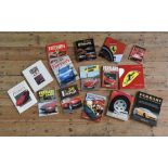 COLLECTION OF 15 FERRARI BOOKS  A quantity of book titles relating to the Ferrari Marque. To include