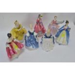 7 Royal Doulton figures. All appear without damage.