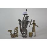 Three heavy cast bronze naïve African figures, possibly Benin, tallest 20cm high