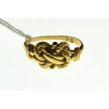 Gold knot ring, marks rubbed, tests positive for 18ct gold, size T, 5.27 grams