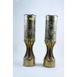Pair of heavily decorated Trench art vases, ruched with oak leaf and bird decoration.