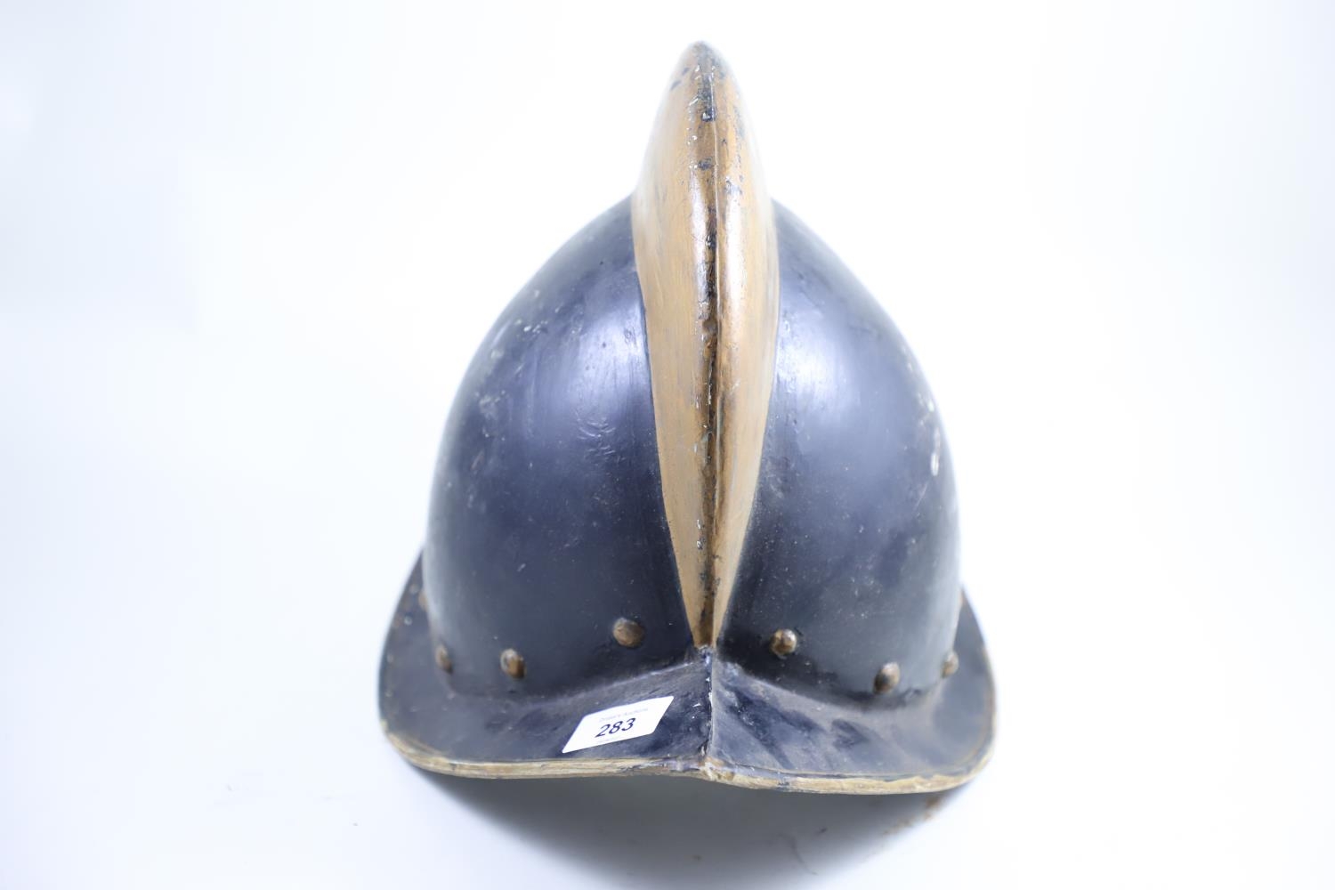 Fibreglass replica of C16th helmet 
