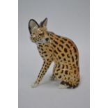 Nymphenburg porcelain Serval big cat, marked and signed to the Base with the initials for theodore k