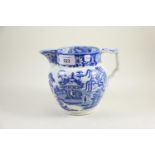 Staffordshire blue & white pearlware jug, early 19th century, decorated with a Chinese scene, 14cm h