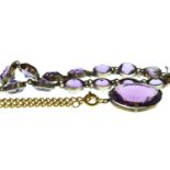 Silver & amethyst coloured bracelet & gilt coloured necklace with amethyst coloured pendant